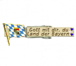 Wiesnklupperl mit Beschriftung und der Bayern Flagge mit den Regierungsbezirken