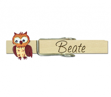 Klupperl mit einer handbemalten Eule in orange