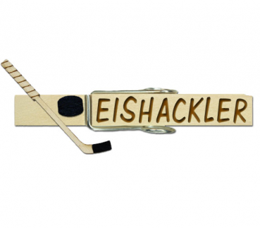 Glubberl mit einem Eishockeyschläger und Puk