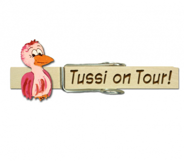 Glupperl mit einem pinkfarbenen Vogel (seitlich)