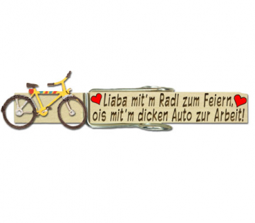 Glupperl mit einem gelben Fahrrad