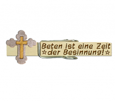 Glupperl mit einem handbemalten katholischen Kreuz