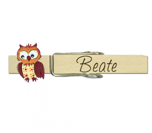 Klupperl mit einer handbemalten Eule in orange