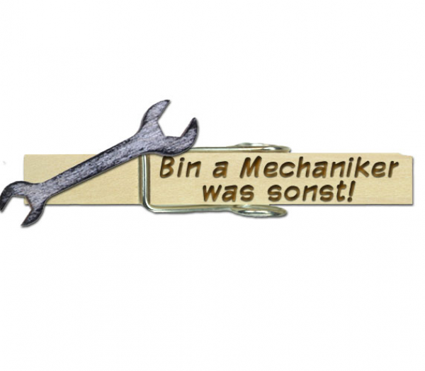 Glubberl mit einem handbemalten Schraubenschlüssel