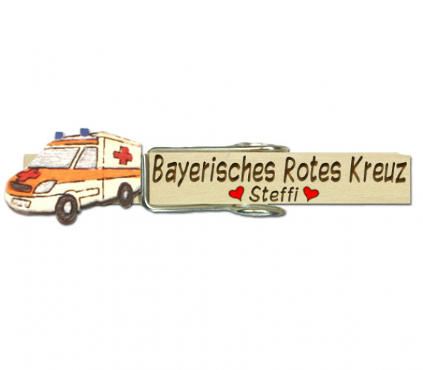 Glupperl mit Namen und einem handbemalten Krankenwagen