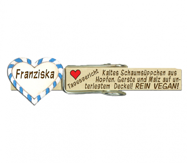 Glupperl mit einem kleinen weißen Volksfestherz