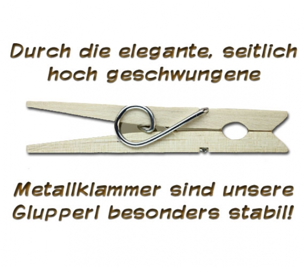 Holzwäscheklammer mit Beschriftung und einer roten Tomate