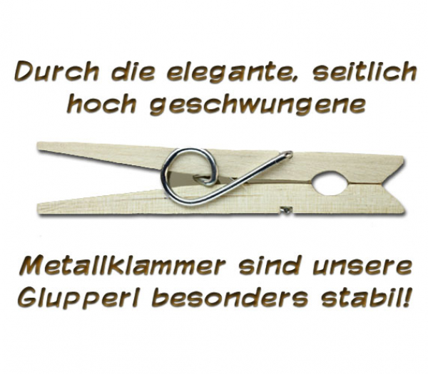 Wäscheklammer und einem handbemalten silberfarbenen Spax mit einem Kreuzschlitzkopf
