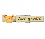 Glupperl mit einem Schaukelpferd