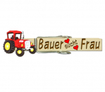 Luxusglupperl mit Namen und einem roten Traktor