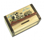 Trickspardose mit einer lustigen Kuh